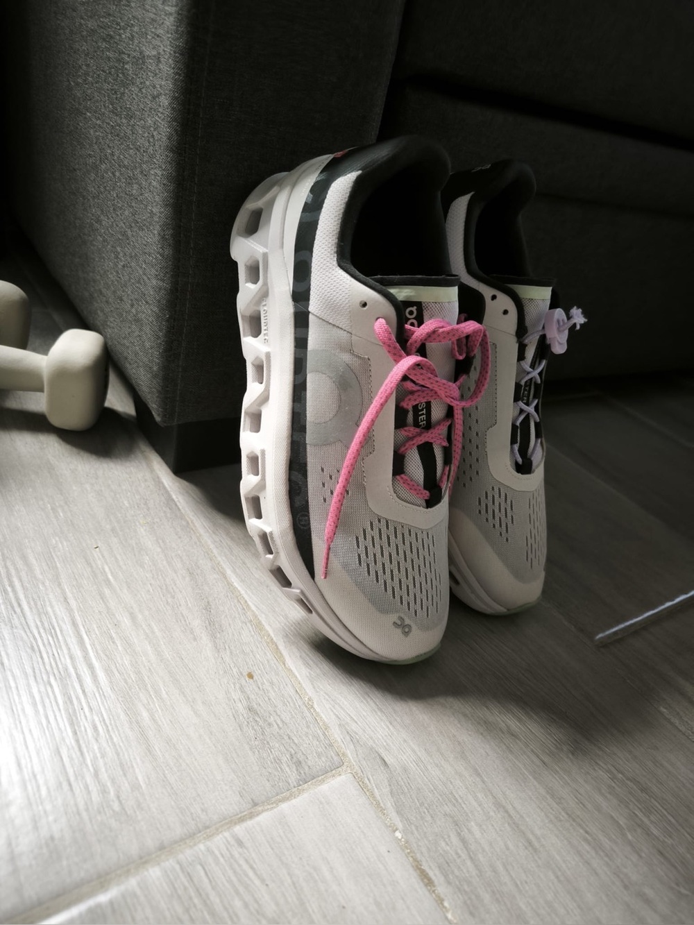 On Running Women's White Athletic Sneakers with Pink Laces